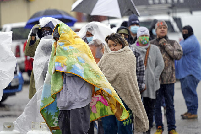 people lined up in the cold